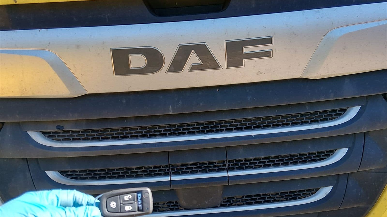 DAF truck front with a programmed key held ready for testing